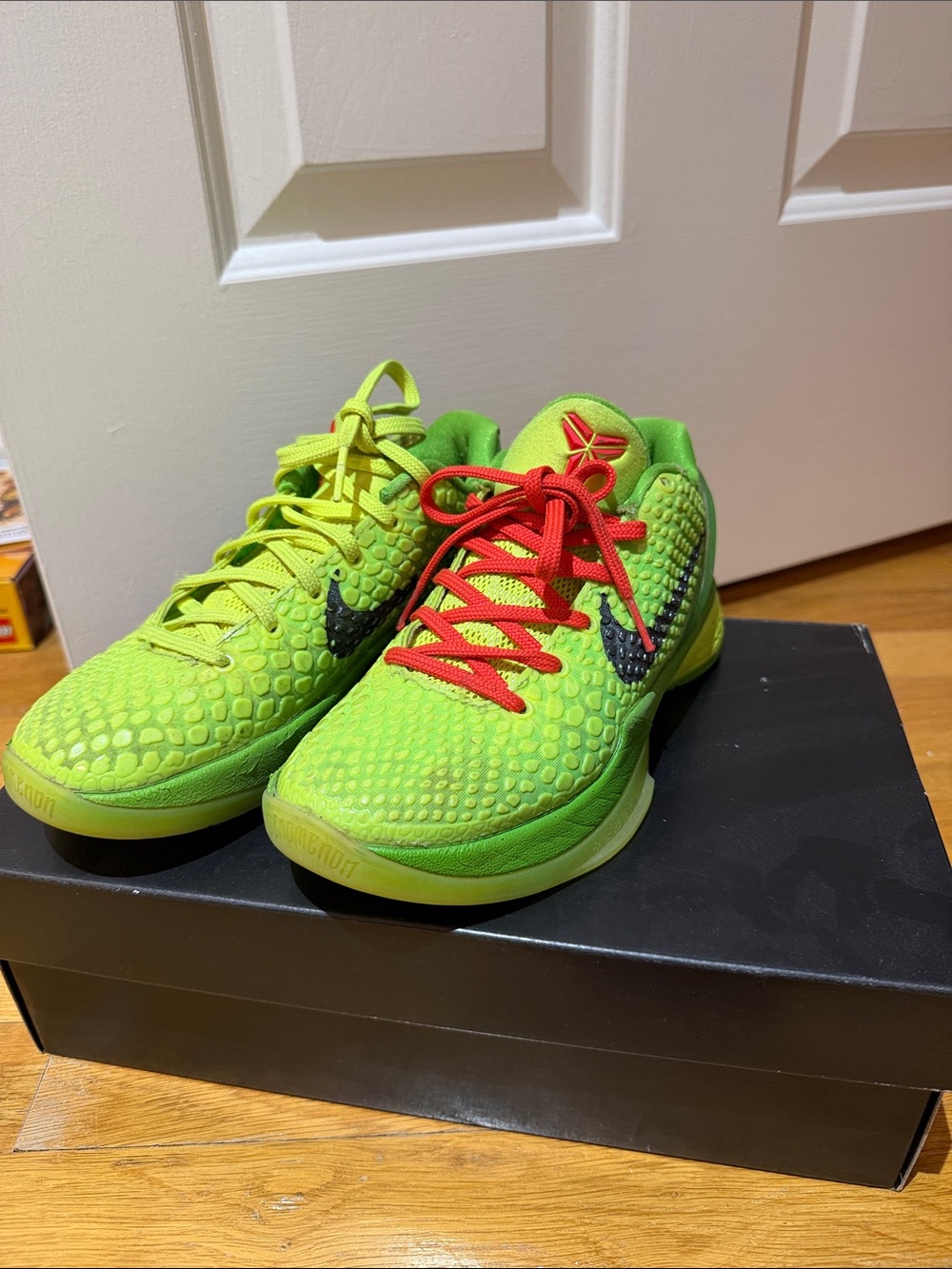 Nike Kids' Neon Green Sneakers with Red Lace Accent